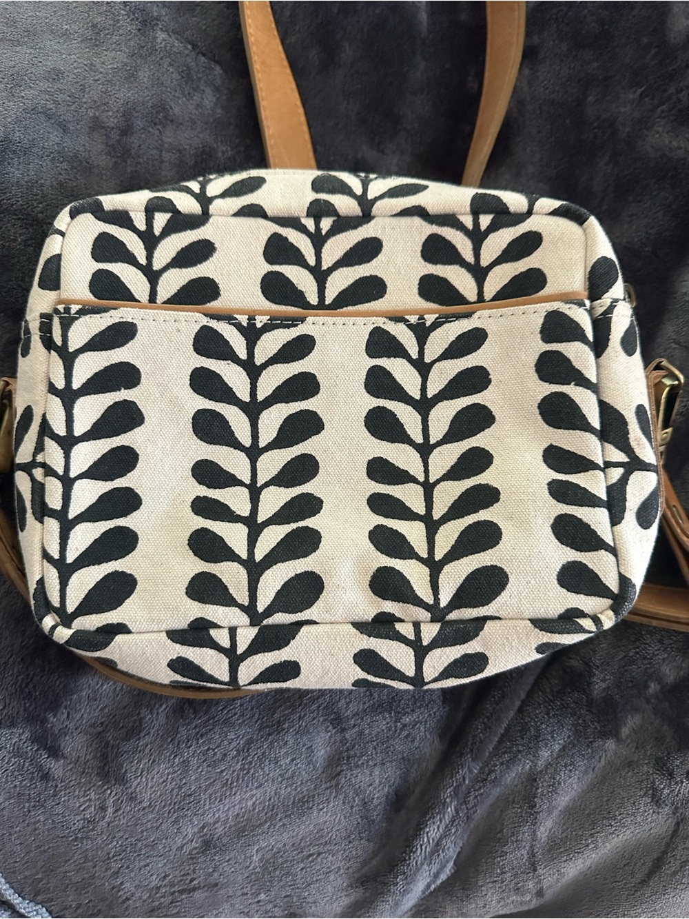 Canvas Crossbody Bag with Black Leaf Motif and Tan Strap